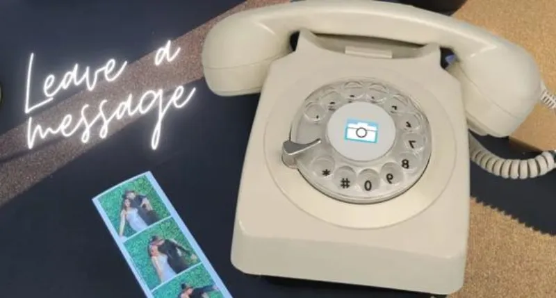 Vintage telephone audio guestbook display at a wedding