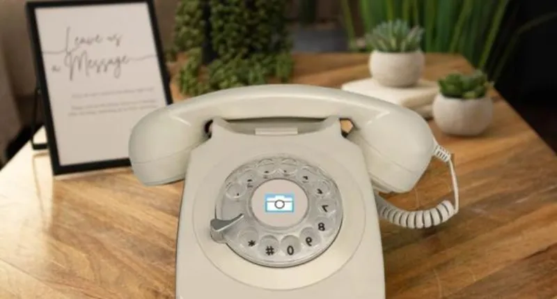 Guests using the audio guestbook phone at an event