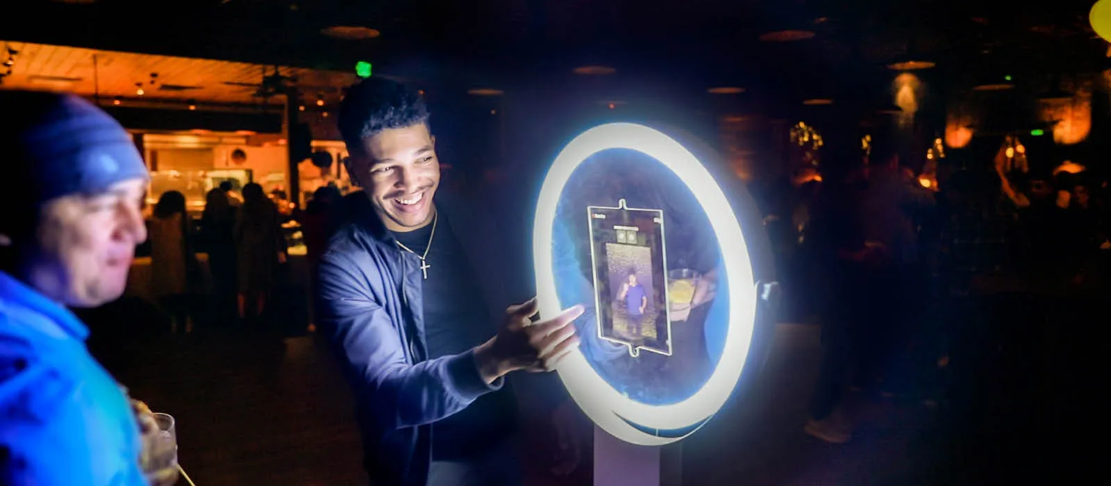 GIF booth setup with LED lights and custom backdrop at a New England event