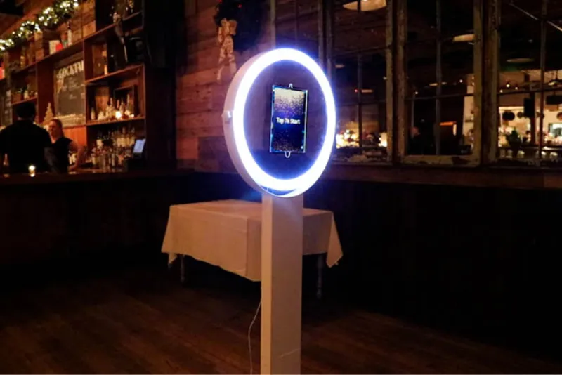 Custom branded GIF booth overlay with company logo at a corporate event