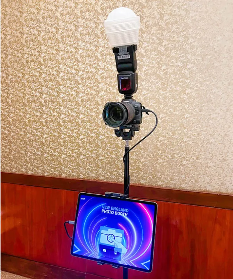 Close-up of the HD Tripod Pro booth display at a New England event