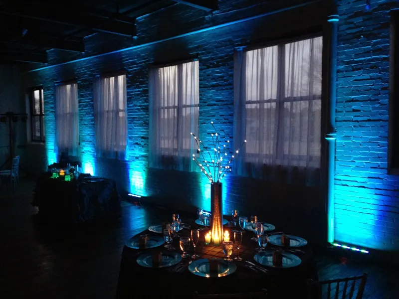 Venue ballroom with blue uplighting along the walls