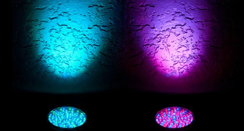 LED uplighting fixtures illuminating venue walls with dramatic ambient glow