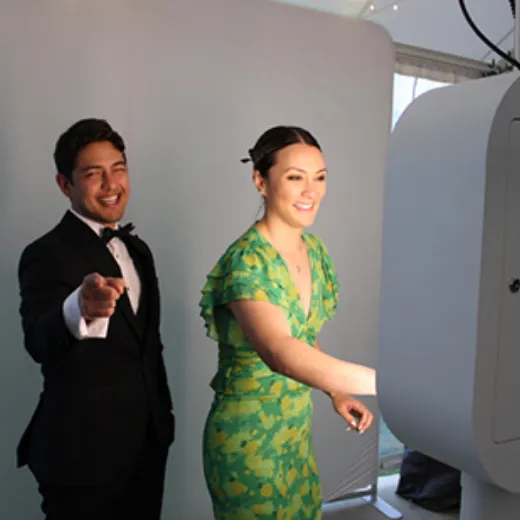Wedding guests using LuxPod to print and filter photos