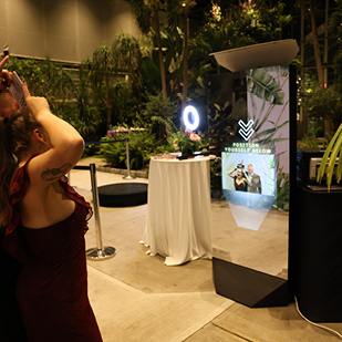 Guests Posing For Mirror Booth Picture