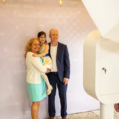 Family posing in the LuxPod photo booth