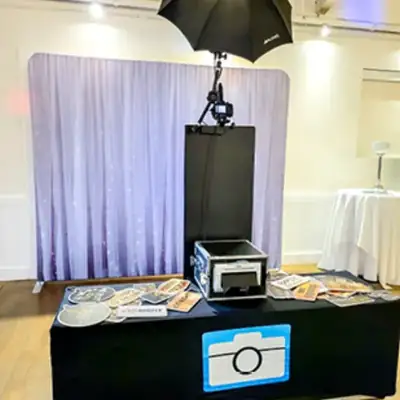 Open Air Photo Tower with props and printer at a wedding