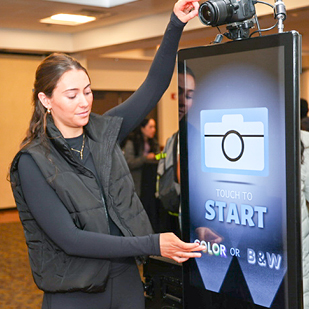 Onsite Technician Touches Booth Screen to Start