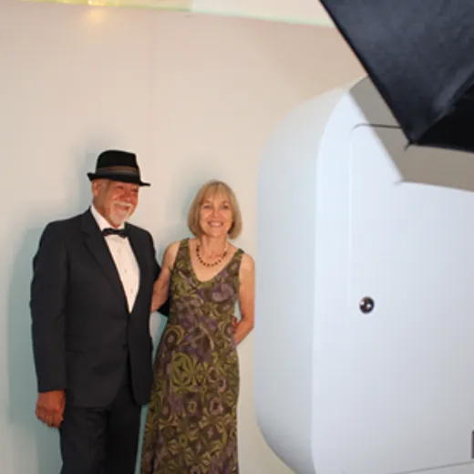 Wedding couple smiling at LuxPod photo booth