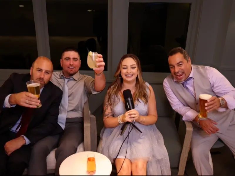 Couple recording message at Confessional Booth