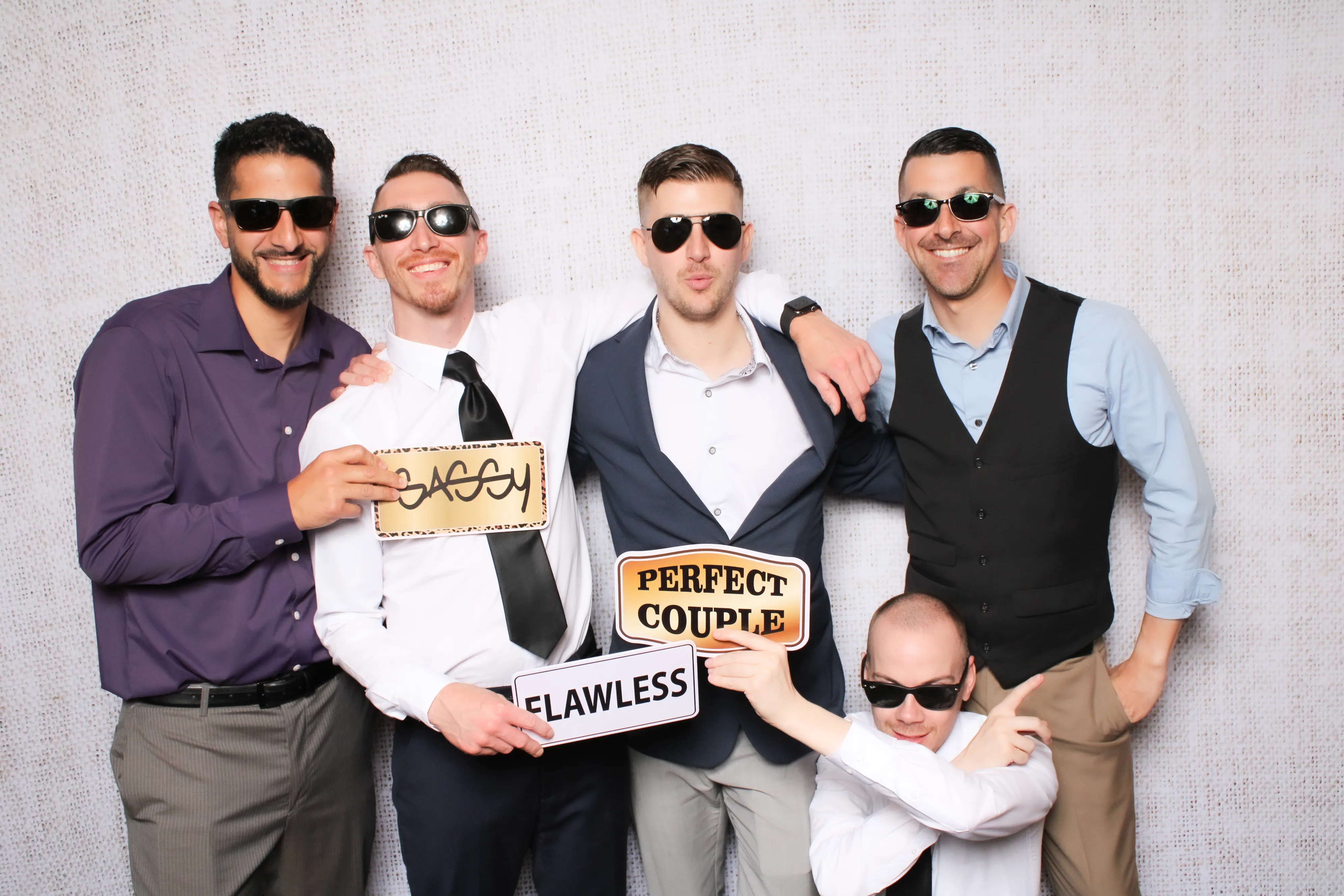 High school students at formal dance photo booth