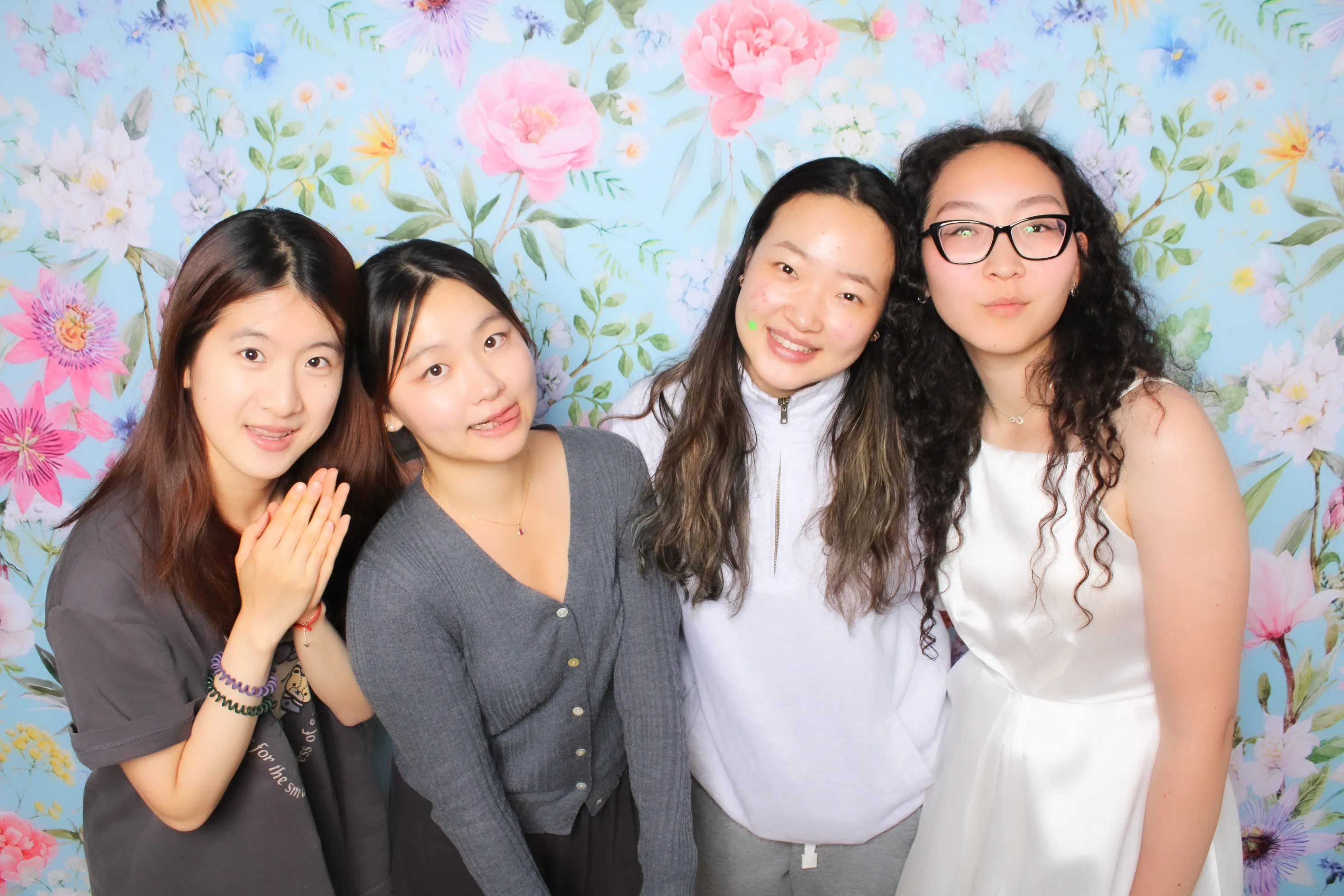 Company holiday party guests at photo booth