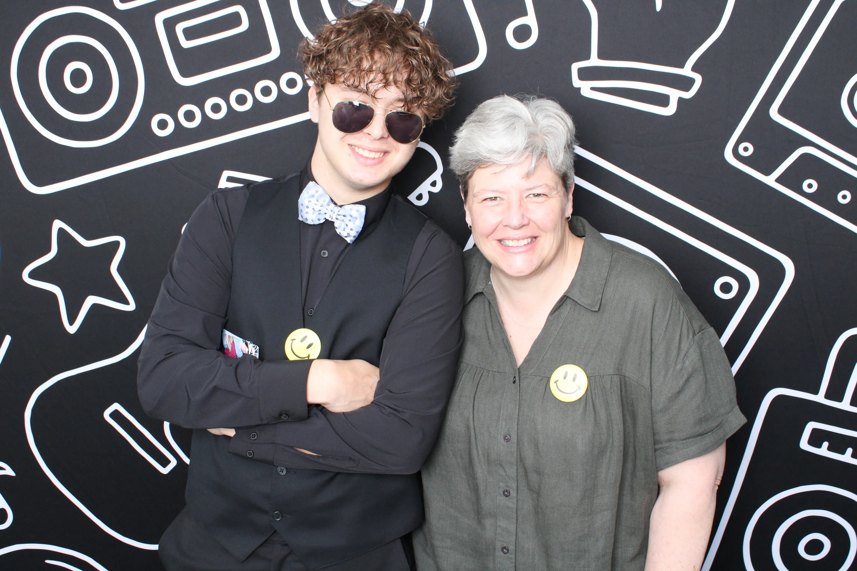 Friends celebrating at photo booth