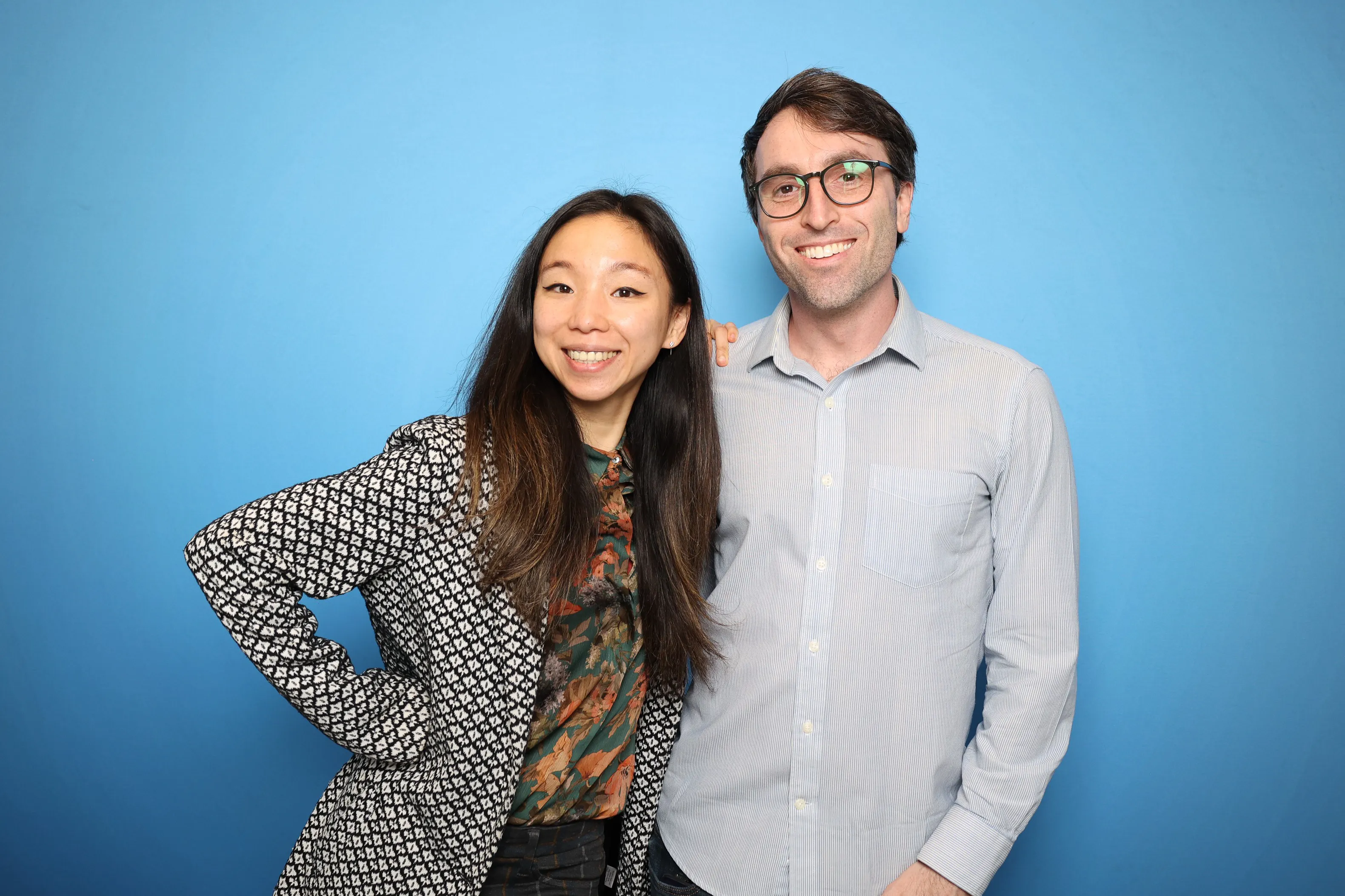 Couple smiling together at wedding photo booth