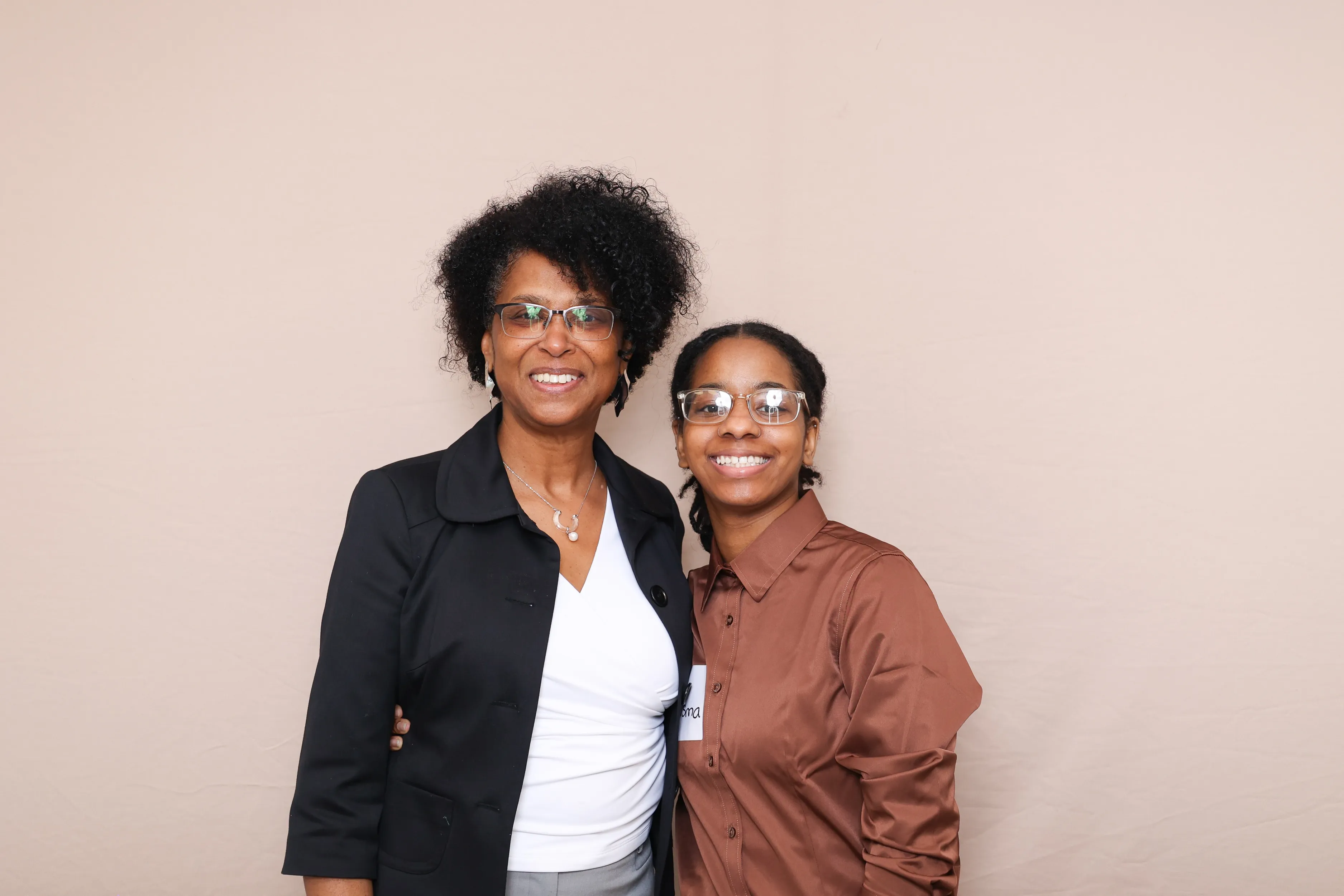 Birthday guests posing at photo booth
