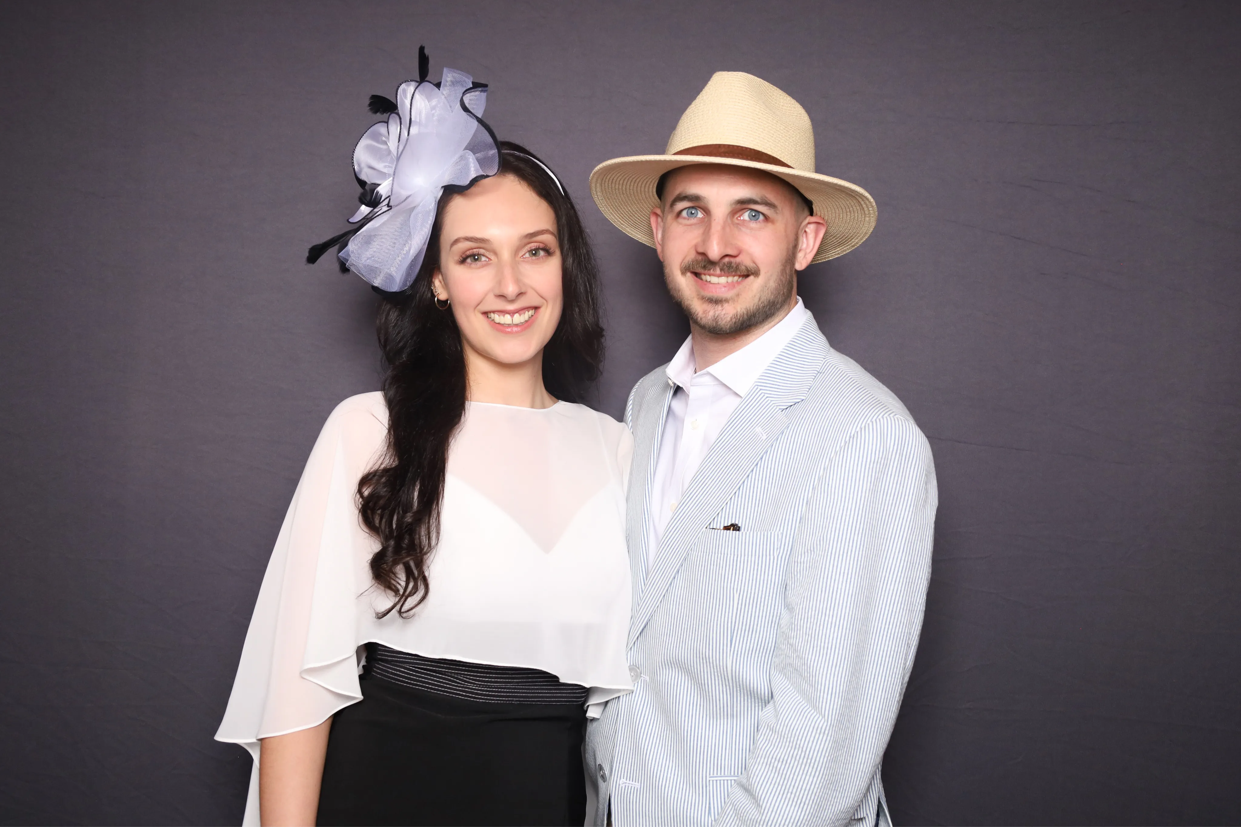 Newlyweds celebrating at wedding photo booth