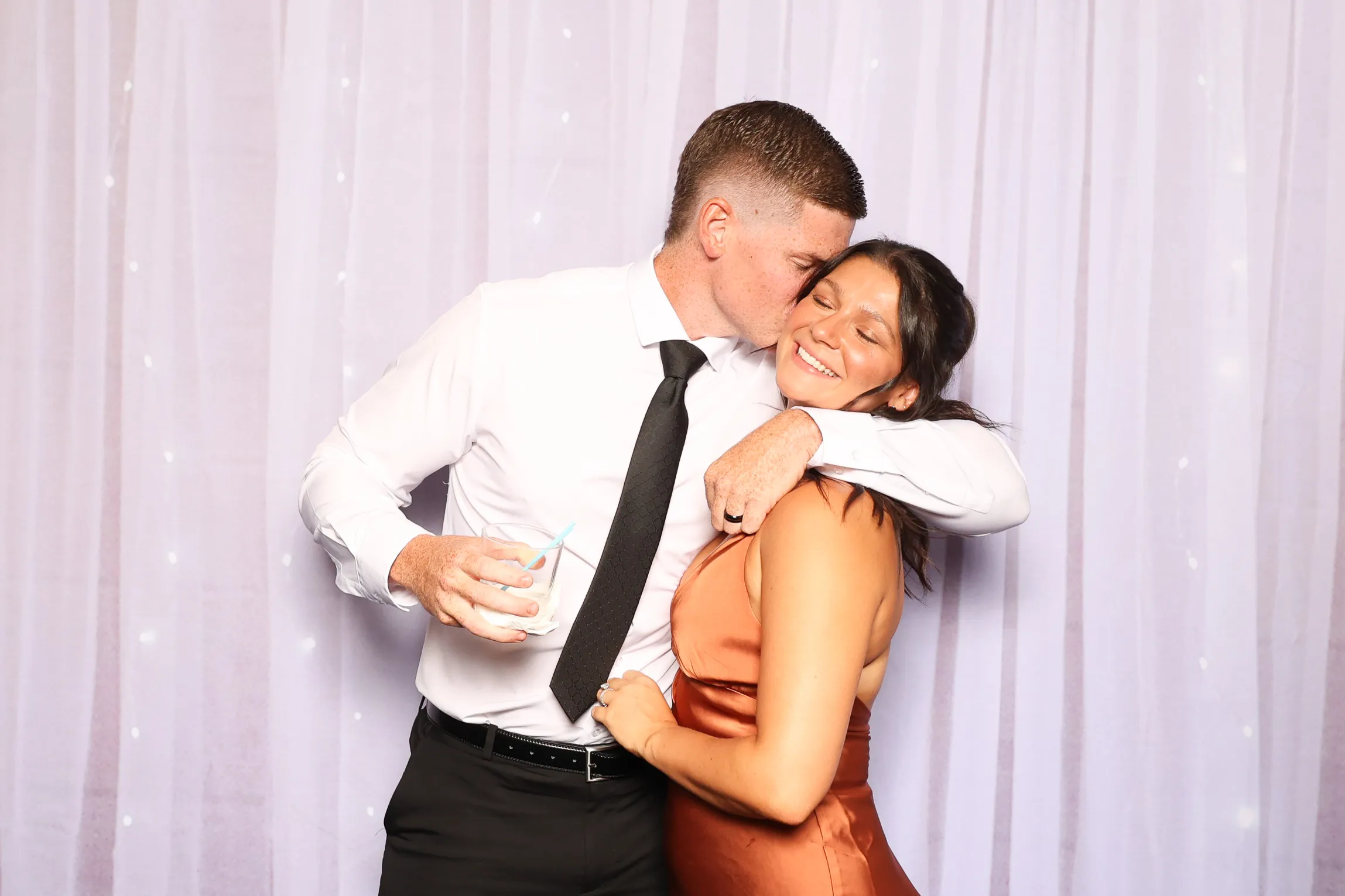 Birthday group posing at photo booth