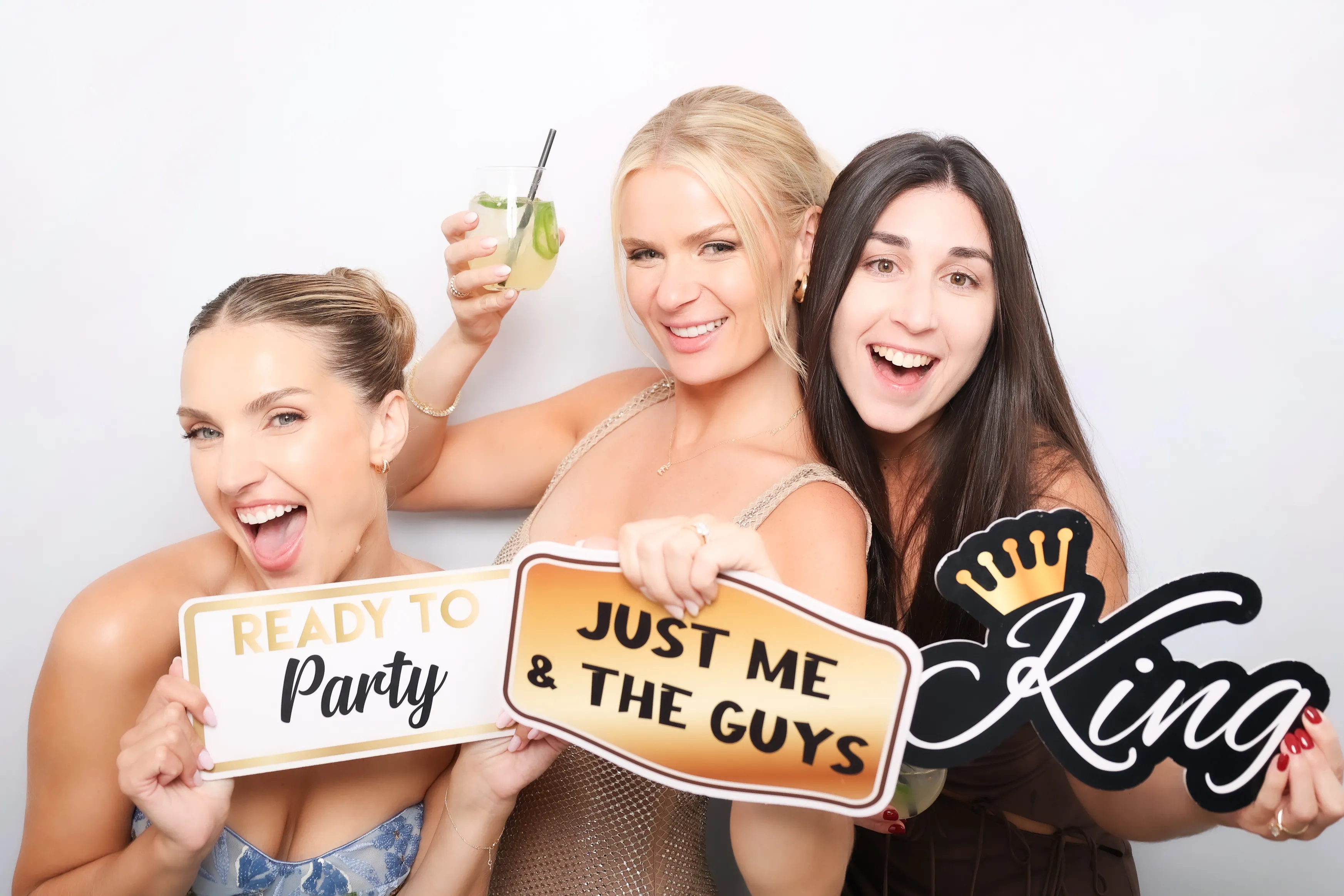 High school students at prom photo booth