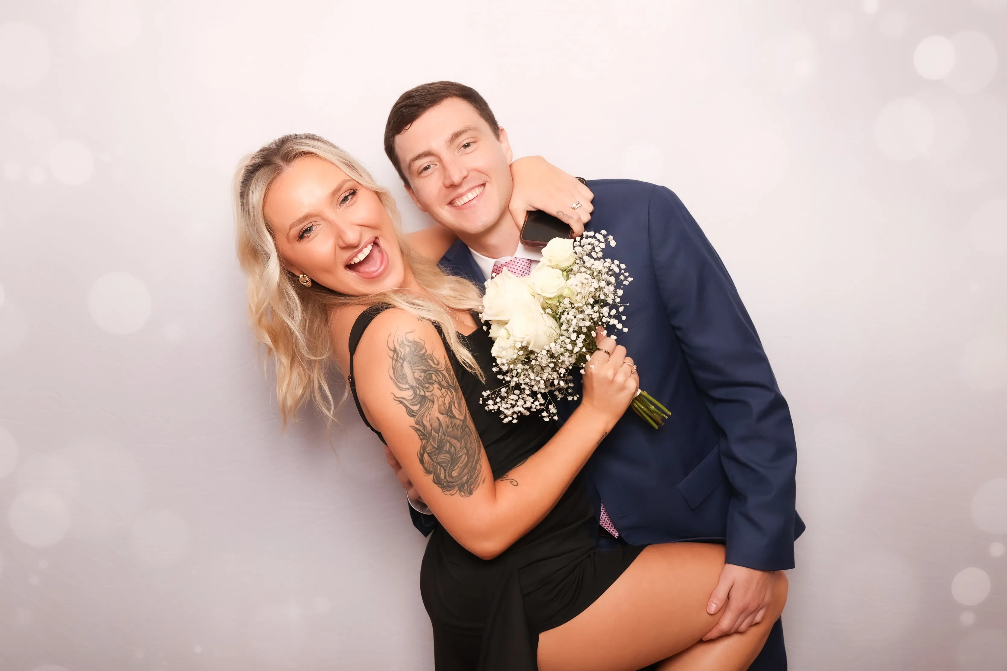 Group of guests celebrating at photo booth