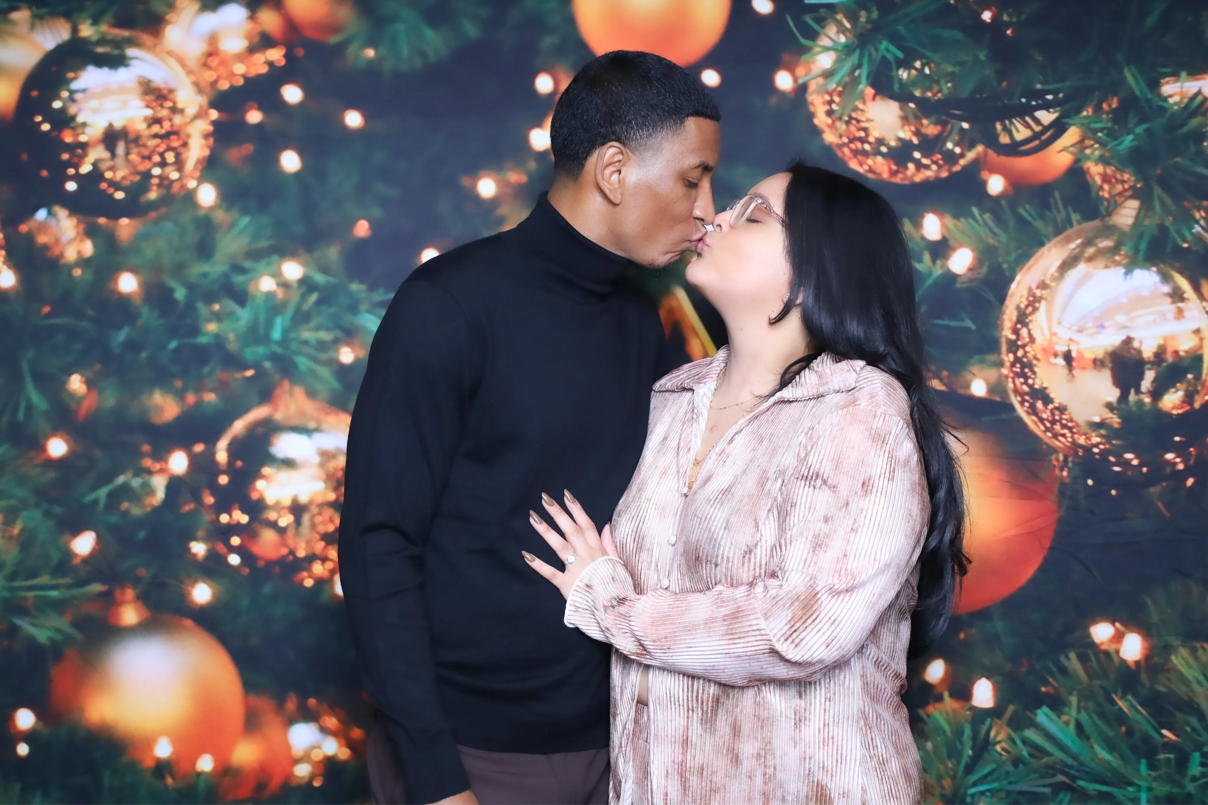 Birthday party guests at open air photo booth