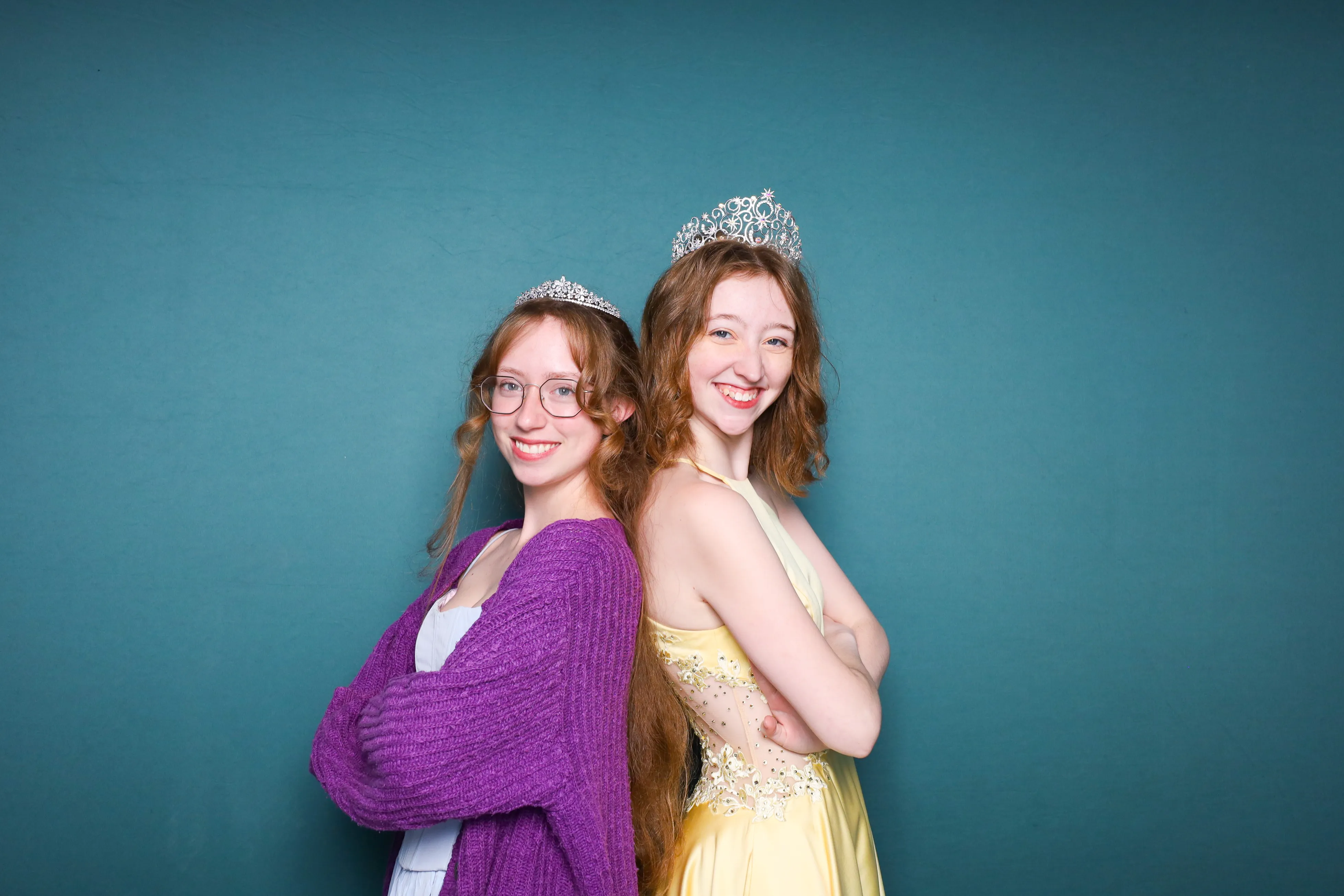 Students at prom night photo booth