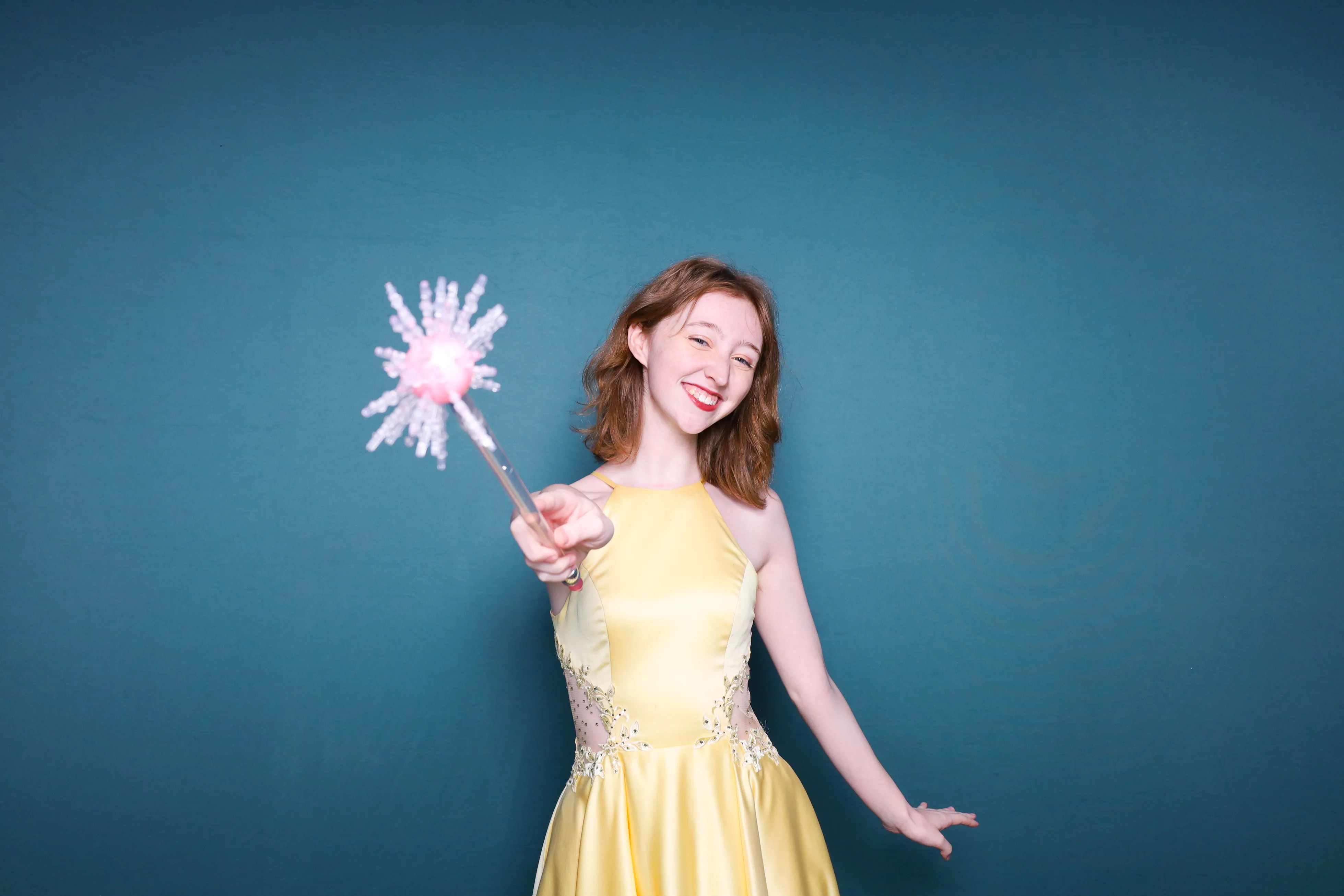 Party guests posing together at photo booth