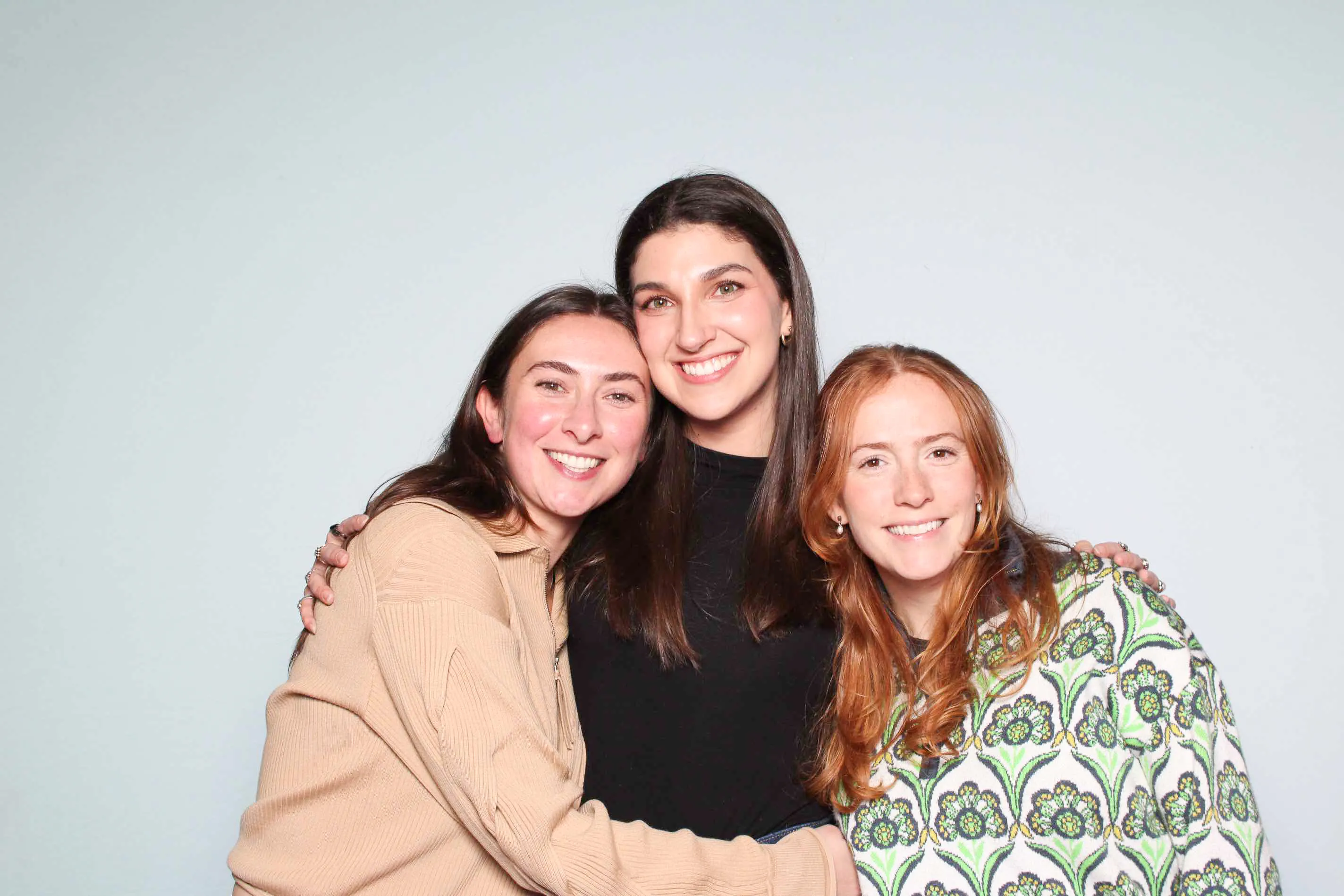 Wedding couple laughing at photo booth