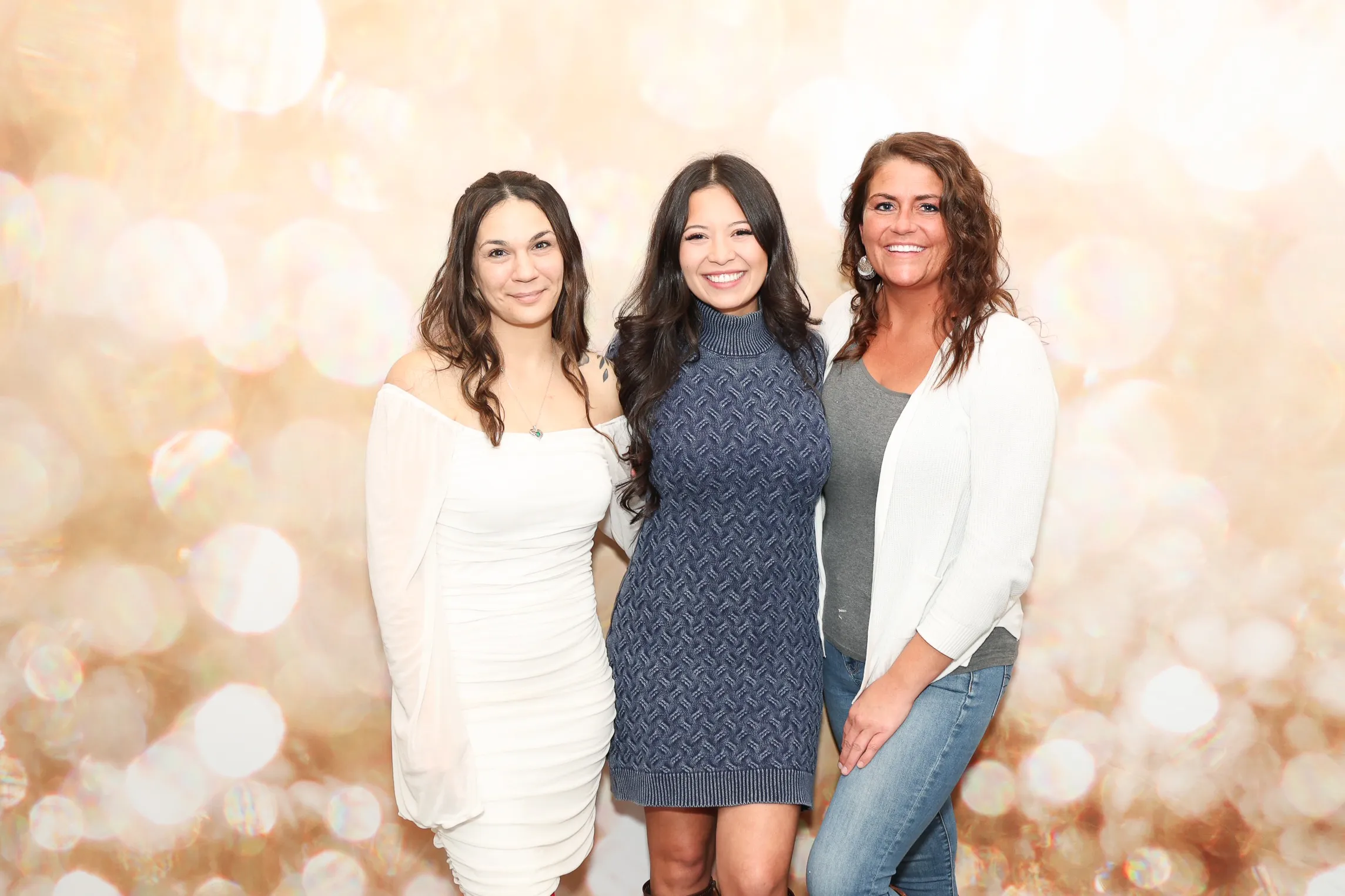 Wedding guests enjoying the photo booth