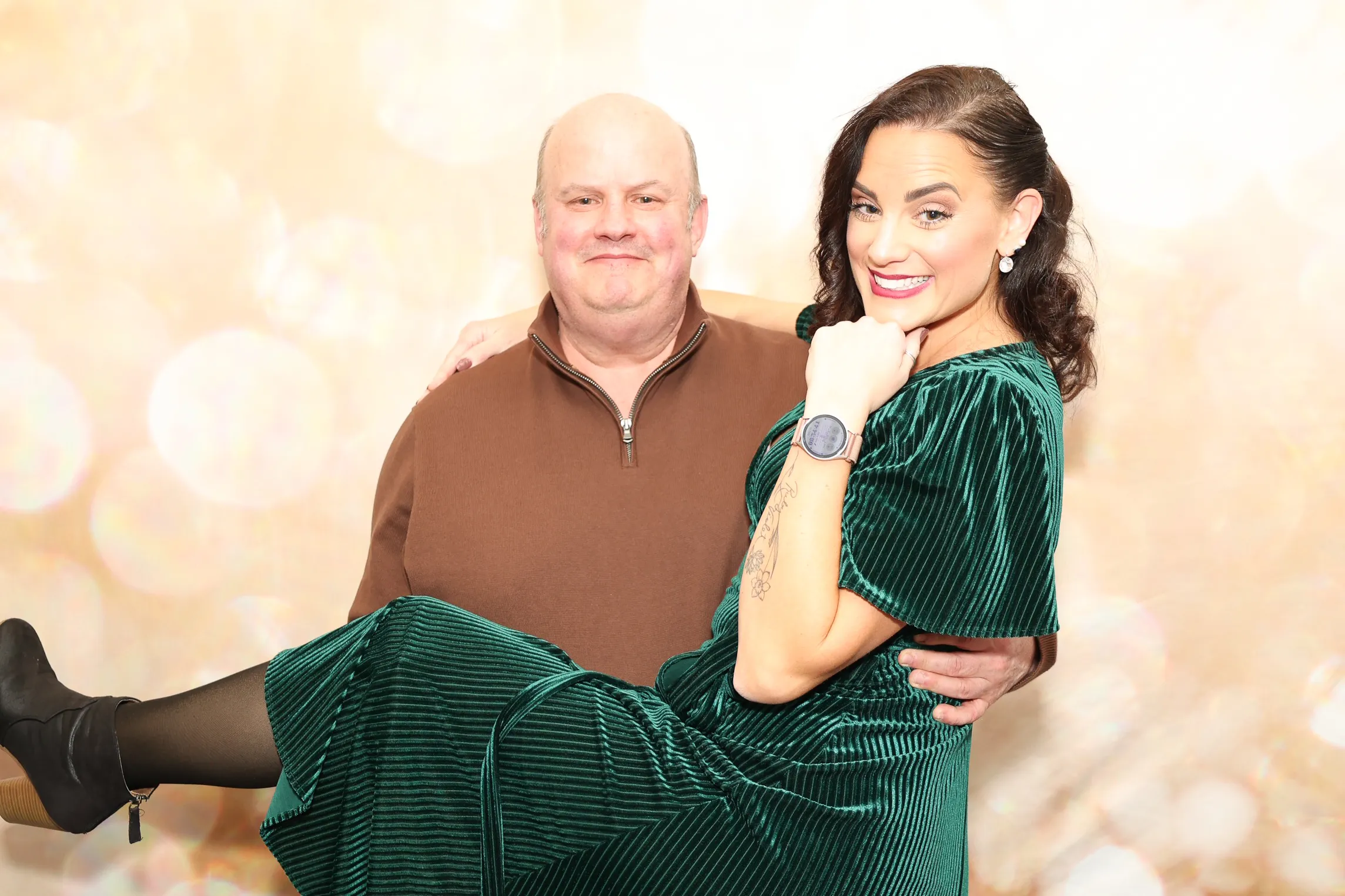 Party guests with oversized glasses at photo booth