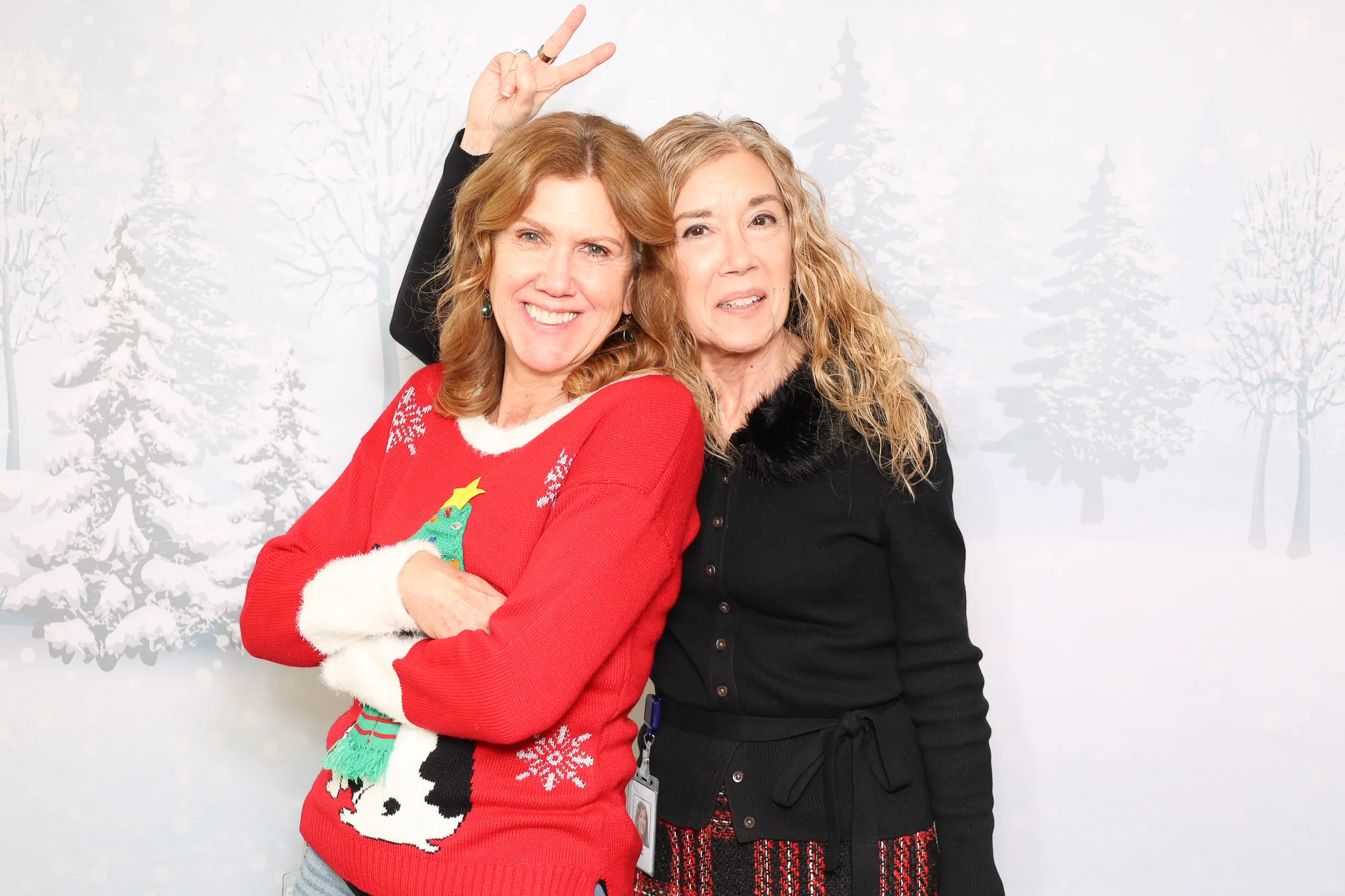 Office team having fun at company photo booth