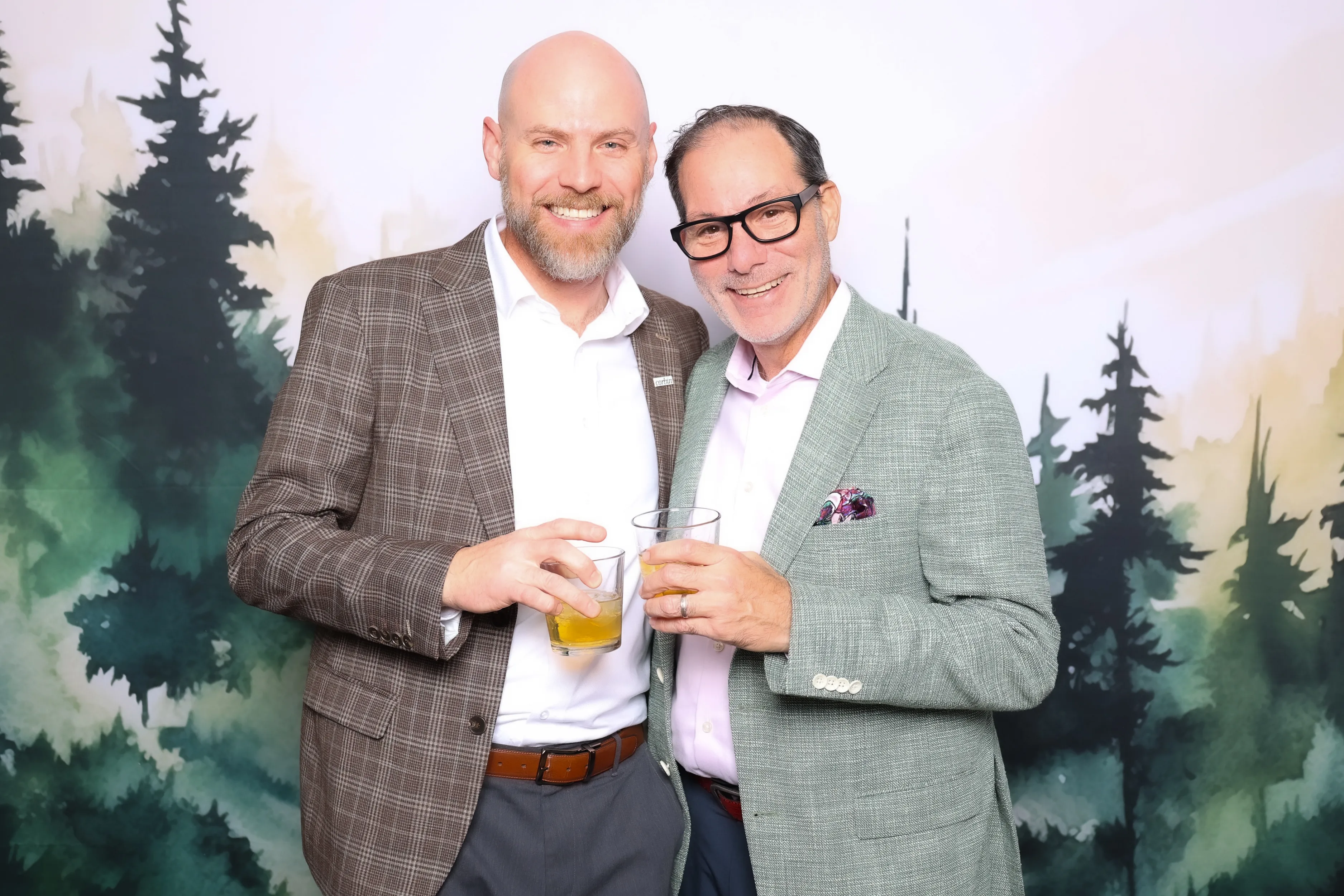 Bride and guests at wedding photo booth