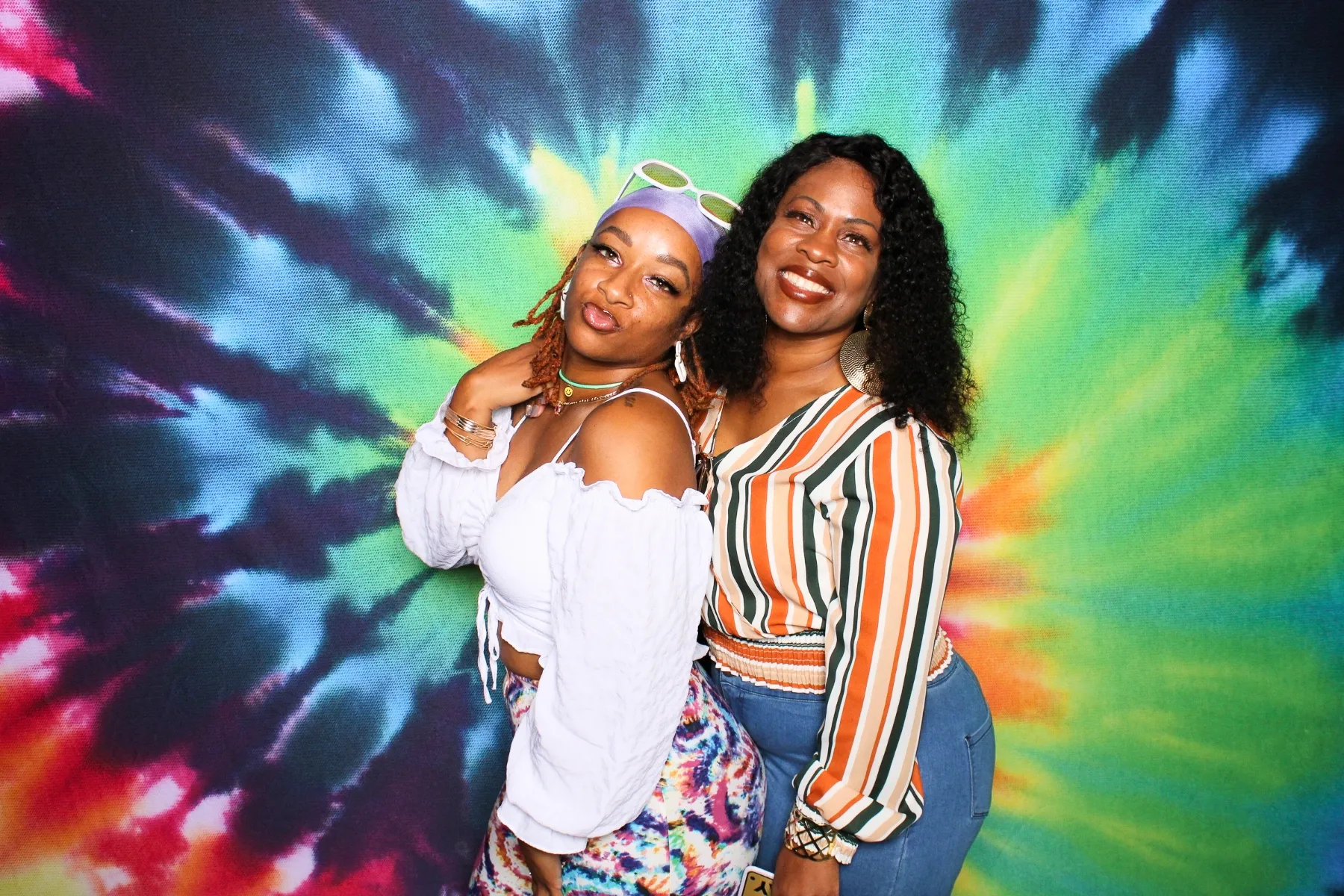 Fun tie dye backdrop at photo booth