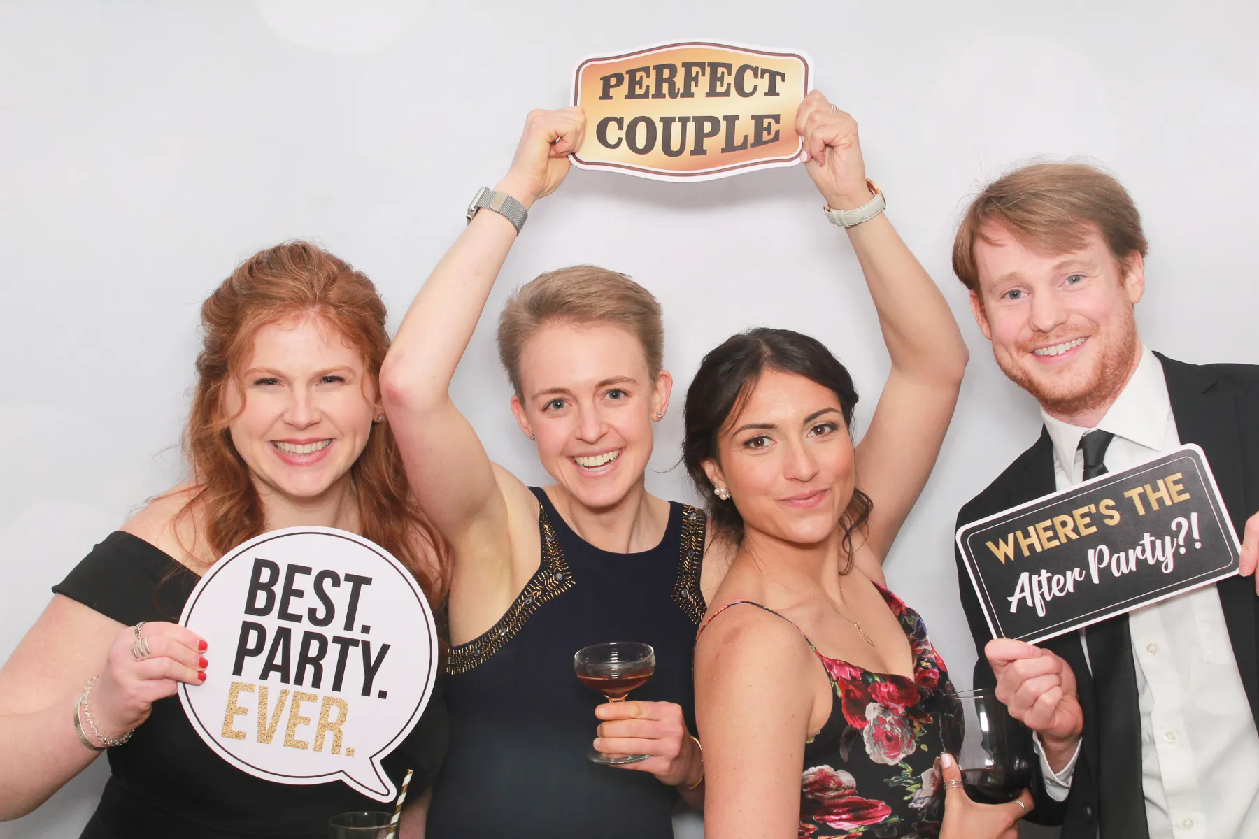 Guests posing at photo booth event