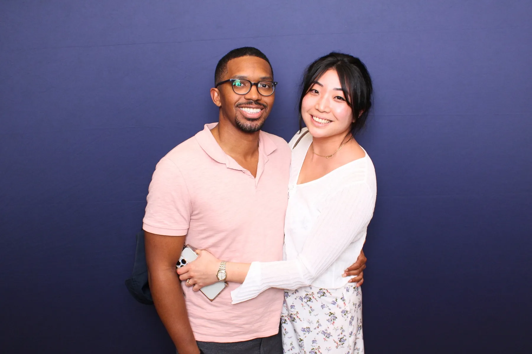Photo booth with sleek navy backdrop