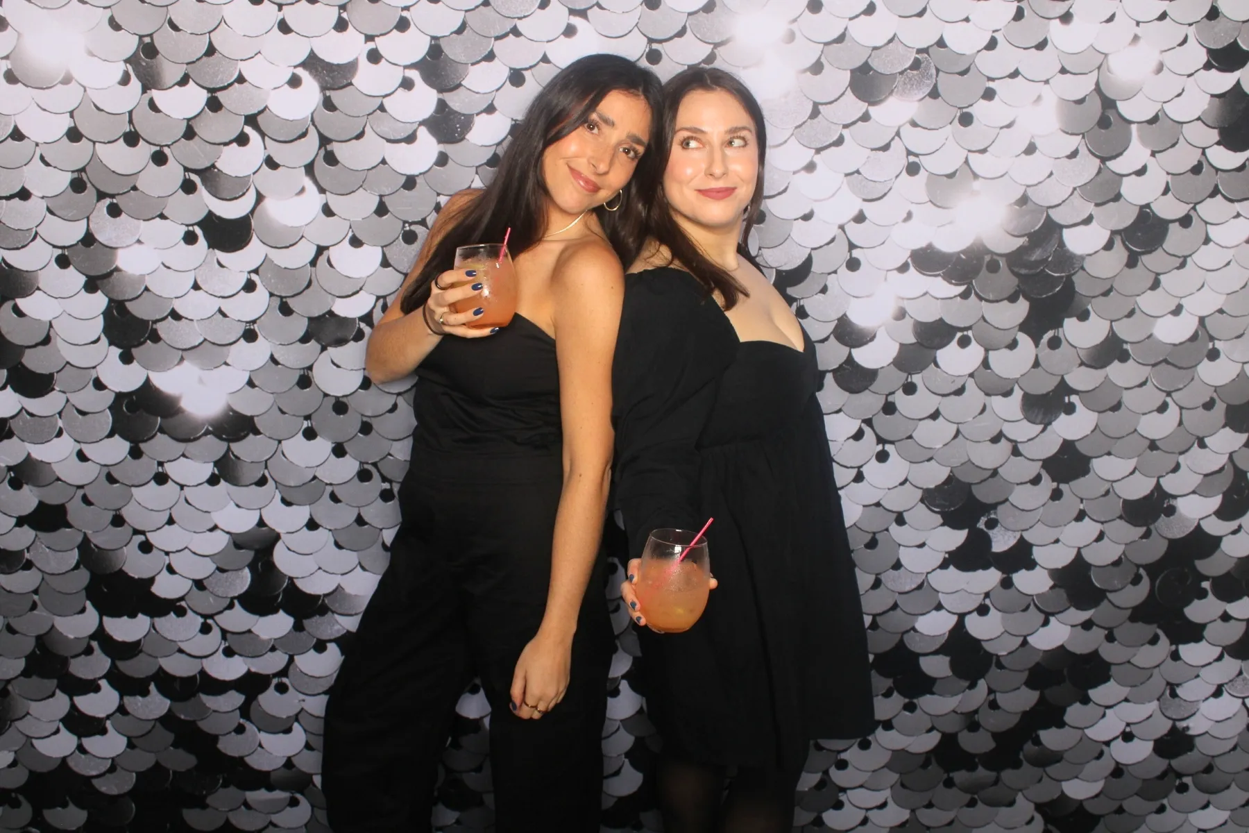 Glamorous silver sequin backdrop at photo booth