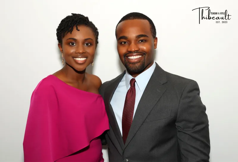 Wedding couple posing at GLAM photo booth