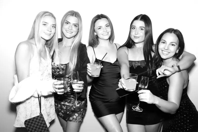 Professional women in elegant attire with GLAM filter