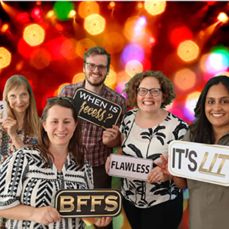 Couple posing with LuxPod green screen camera