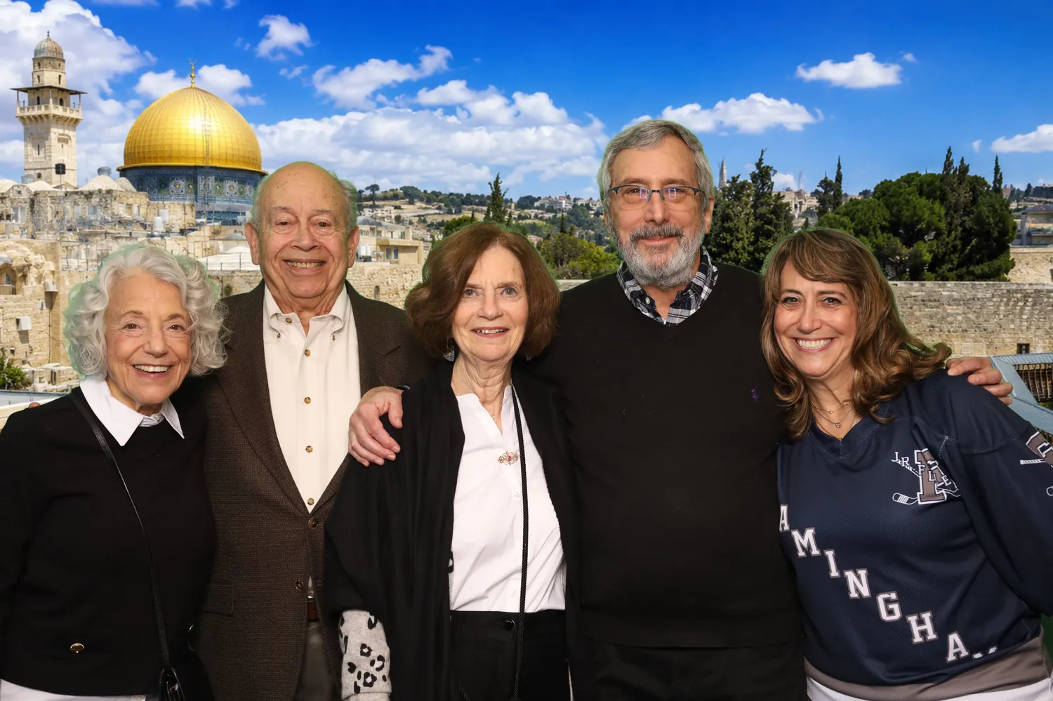 Family on a Jerusalem green screen background at a photo booth event