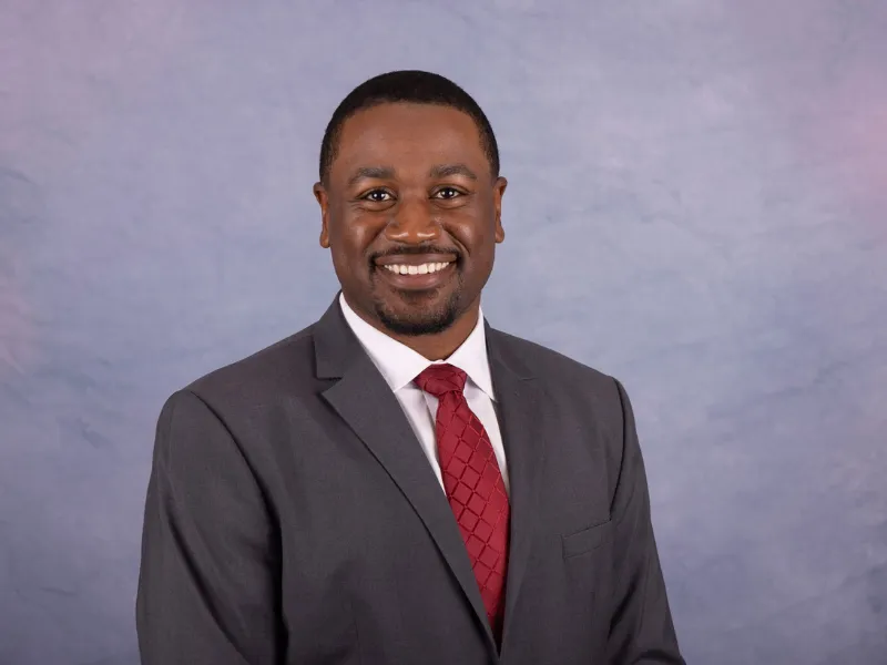 Professional business headshot with strobe flash lighting