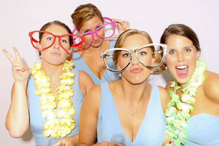 Bridesmaids group shot in open air photo booth