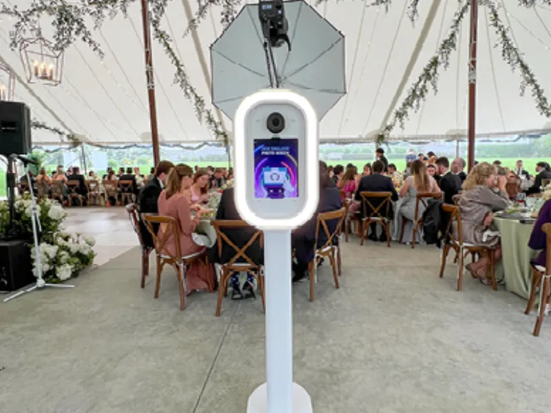 Guests enjoying the LuxPod at a wedding reception
