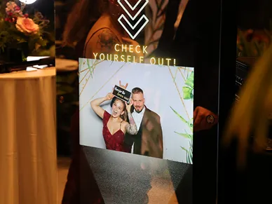 Mirror Booth touch screen display with start button at a wedding venue