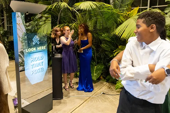 Personalized Mirror Booth photos with custom logos and branding overlays