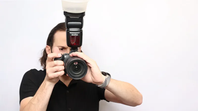 Professional eventographer photographer capturing candid moments at a party