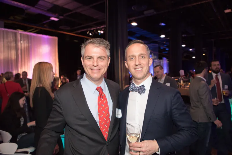 Eventographer capturing candid moments at a corporate event