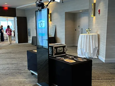 Guests using the Open Air Photo Tower at a wedding reception